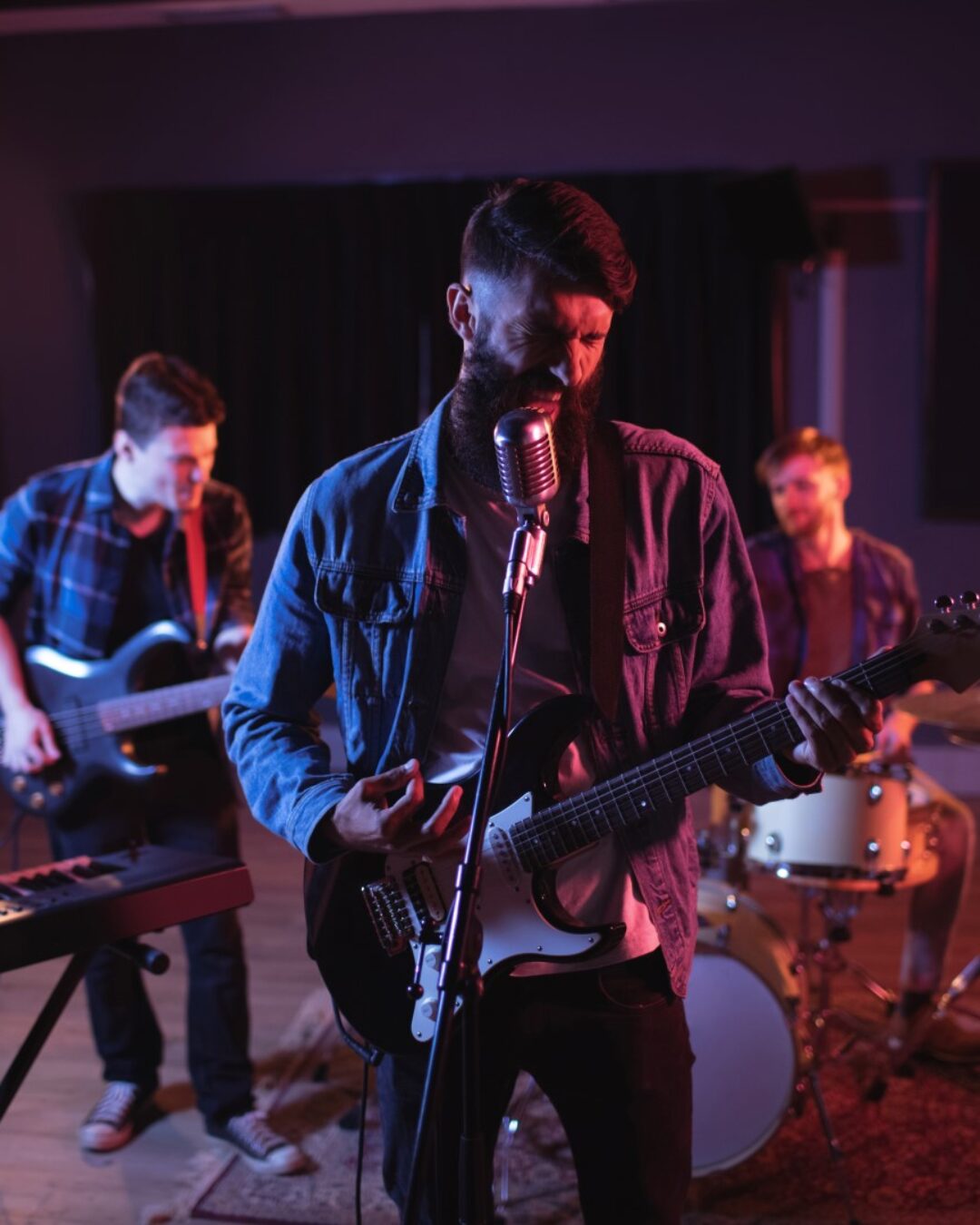 Band performing in recording studio