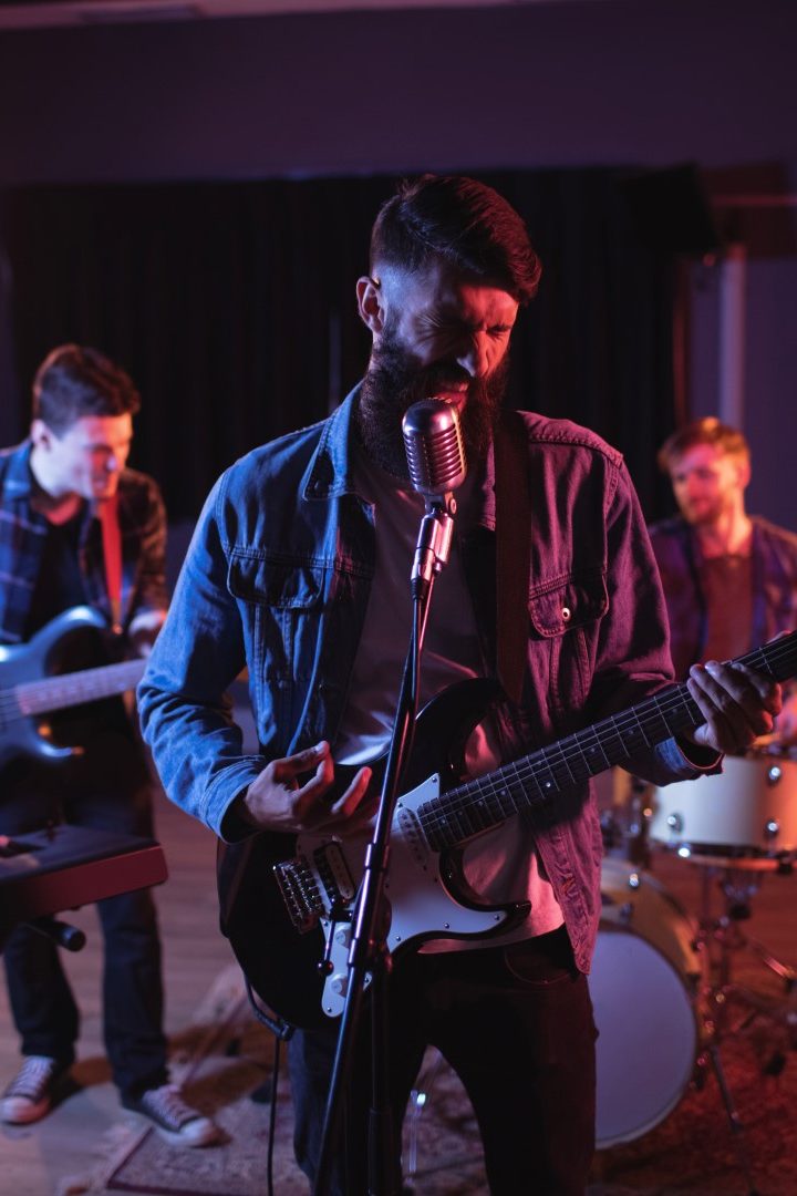 Band performing in recording studio Band performing in recording studio