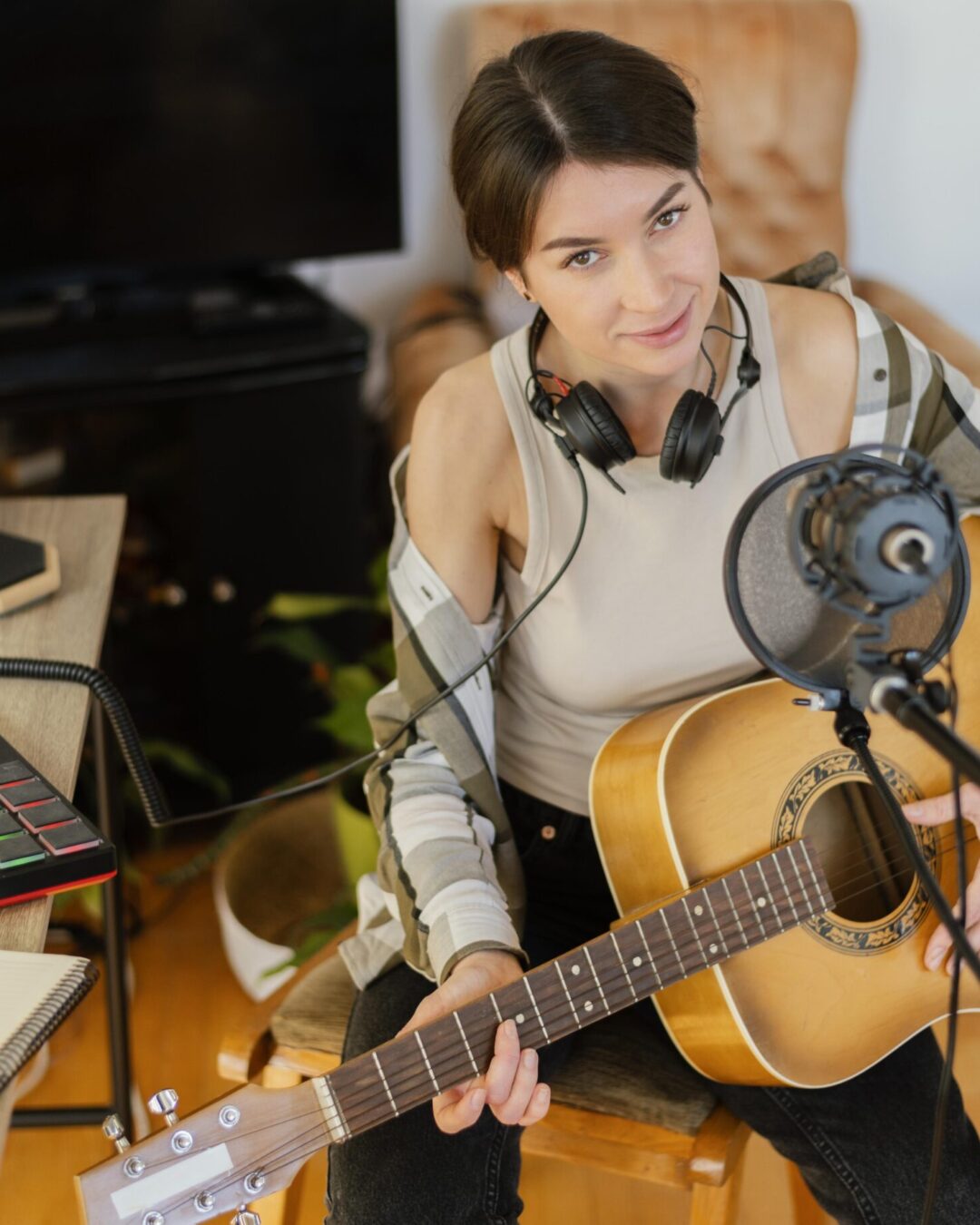 creative-woman-practicing-song-home
